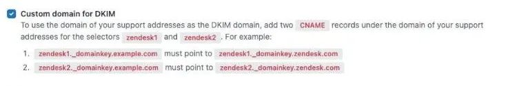 Zendesk Admin Center 的 email 設定畫面:一個標示為 Custom domain for DKIM 的勾選框,目前狀態是已勾選;勾選框下方是 Zendesk 自己的說明文字,要求在自家 DNS 加上兩筆 CNAME 記錄,分別命名為 zendesk1 與 zendesk2,說明中以 example.com 作為範例網域